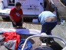 Simon and Lee reorganising everything on the pontoon prior to the trip
