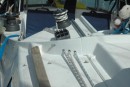 The holes in the upstand, with reefing lines