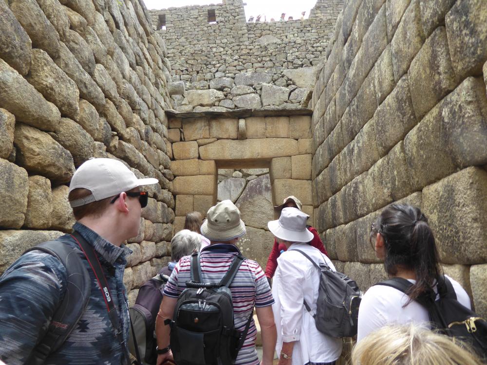Our group dmiring the temple entrance, Machu Picchu