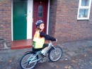 Tully riding her bike in Farnham Gardens