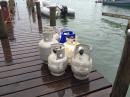 propane jugs ready to load onto lancha 