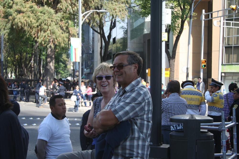 Linda and Jim watching the action on the street
