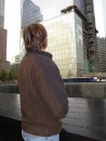 Mark looking up at One World Trade Center aka The Freedom Tower behind the 9/11 Memorial where the north tower once stood