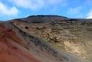 Verschillende kleuren (lava)rotsen naast elkaar bij El Golvo.