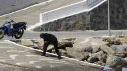 You know you are in Greece when fishermen slam octopus against a rock or concrete boat ramp 