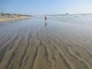 Matthew walking the beach in Oceanside, CA.