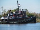 Tugs that manage large ships on the Cape Fear River.  