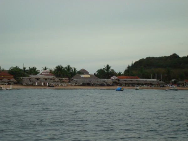 The palapas ashore Isla Grande
