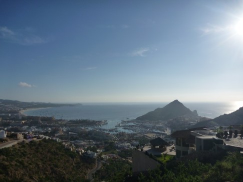 view from hills above Cabo, our boat is at anchor in the harbour!