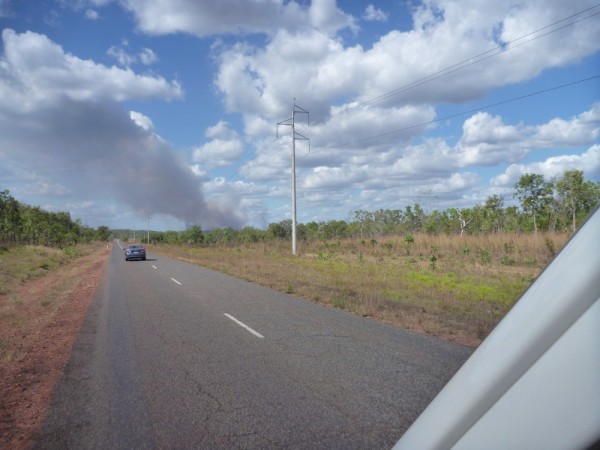 Bushfire burns ahead of us. Aboriginals burn the land frequently to allow for new growth.