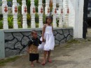 These two tykes were just leaving church together- they loved looking at the image of themselves in the camera