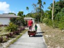 Michael and his little friend JJ at Happy HaaPai Divers- JJ is only five but can pull this cart, loaded with tanks himself