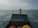zekiel drives the sampan to shore