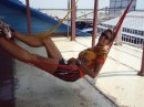 Debby tries out one of the many hammocks seen everywhere in Cambodia, this one on a Tonle Sap lake floating restaurant 
