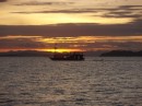 Komodo tour boat leaving at sunset