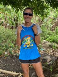 Debby shows off her Hash House Harriers shirt in Grenada