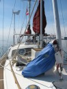 NELLEKE steaming out into the harbour from the foredeck.  No wind but a beautioful day non-the-less