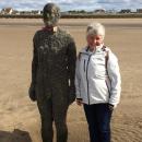 Nic with Anthony Gormley statue in Crosby on way back to Scotland