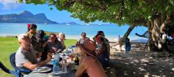 Potluck on Taravai Is. : Local residents, Herve and Valerie, one of 3 couples who live on the island, host a potluck for cruisers every Sunday, weather permitting. We shared the day with crews of 3 French boats and one Norwegian boat. 