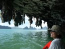 Kayaking on Ko Phanak. Most of the island is undercut by the ocean with limestone stalagtites hanging like a curtain from the cliffs.