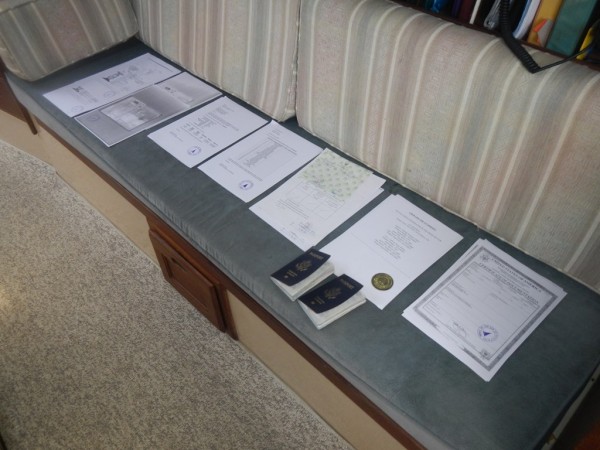 Our "smorgasboard" of paperwork on Mokisha