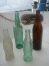 coke & sake bottles we found at some of the WWII sites