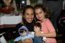Cammi giving cousin, Sophia, American Girl twins