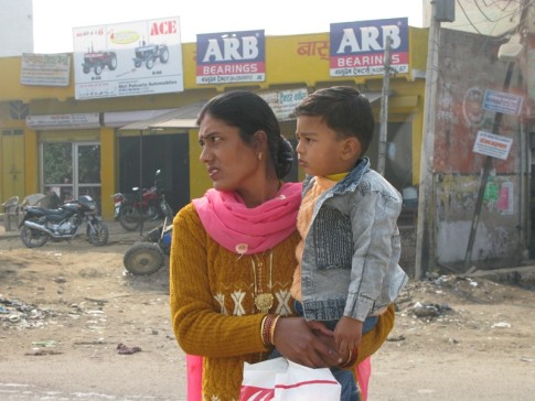 Mom and son waiting to cross the street