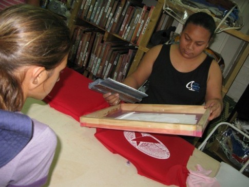 Cammi learns about silkscreening from Isa at Tropical Tease in Neiafu, Tonga