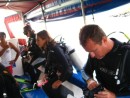 Tom and Cam preparing for Galapagos dive