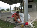 Tom with our Code-Zero cuben sail, making an adjustment in Niuatoputapu, Tonga
