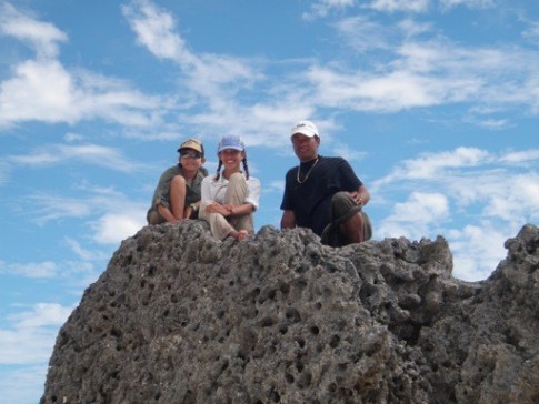 Niko, Cole and Cammi atop a volcanic rock in Tofahi, Tonga
