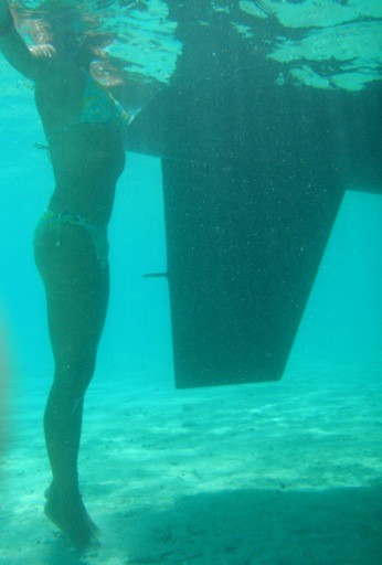 Zen in 5-feet of turquoise water, Monique at the rudder, Taha