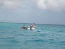 Suwarrow, boys playing and dive bombing sharks
