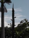 carved pole in a park near the marina