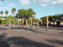 plaza in Place des Cocotiers - the downtown park - note the umbrellas