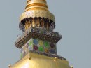 Wat Suan Dok: Elaborate spire on gilded dome.