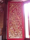 Wat Chet Yot: Wonderfully ornate and glided window shutters.