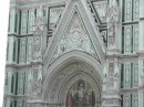 The Basilica di Santa Maria del Fiore: Closeup of arch over the central entrance.