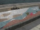 Beautiful mosaic along the waterfront wall.