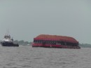 a loaded barge coming out the river as we were going in