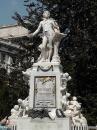 Mozart statue in the Burggarten behind Austrian National Library.