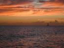 Just another dull sunset in the Caribbean with a late arriving sailboat to the anchorage.
