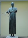 The Charioteer was preserved thanks to natural catastrophe - an earthquake in 373 BC buried it; part of a larger bronze composition; only the charioteer with reins in hand survived intact.
