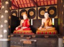 Wat Chedi Luang: Buddhas with various garb and positions signify different tenets or dates and times to be observed.
