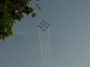 Swiss Air Force jets flying in formation –later doing stunts. 
