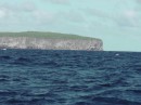 Makatea in the distance; the one Tuamotu atoll that isn