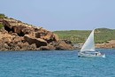 Fishing boat under sail in Cala Grao