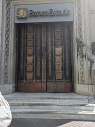 The solid copper doors of the bank