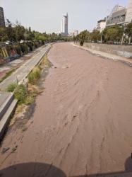 The Maipu river with Chocolate milk run-off in Santaigo